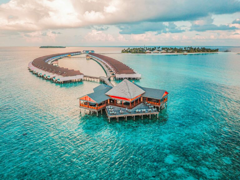 Mauritius vs Maldives comparison featuring beaches, luxury resorts, travel costs, and best time to visit